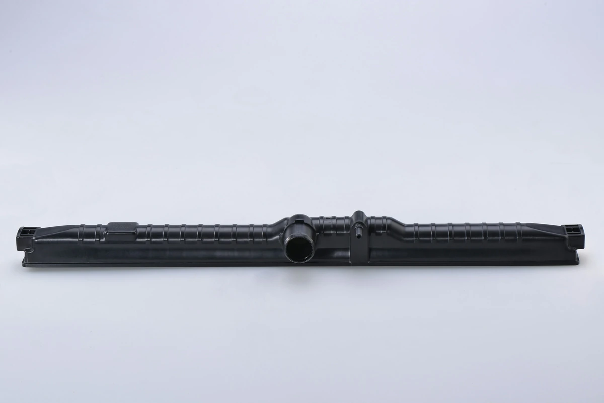 Molded tubular component