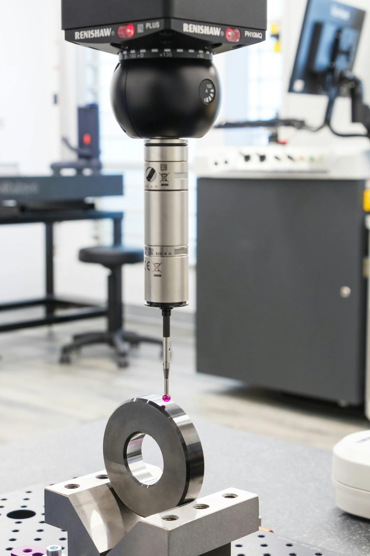 Coordinate measurement probe checking a mounted component