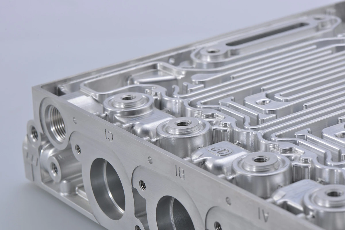 Complex machined metal housing features