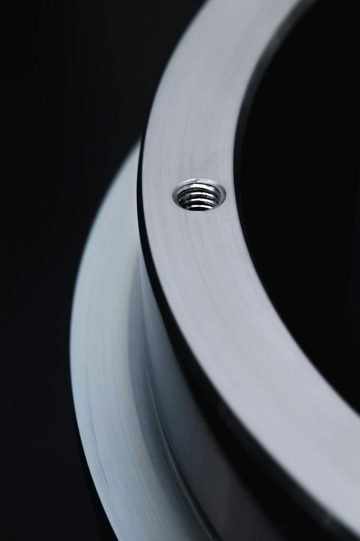 Machined circular face and threaded hole