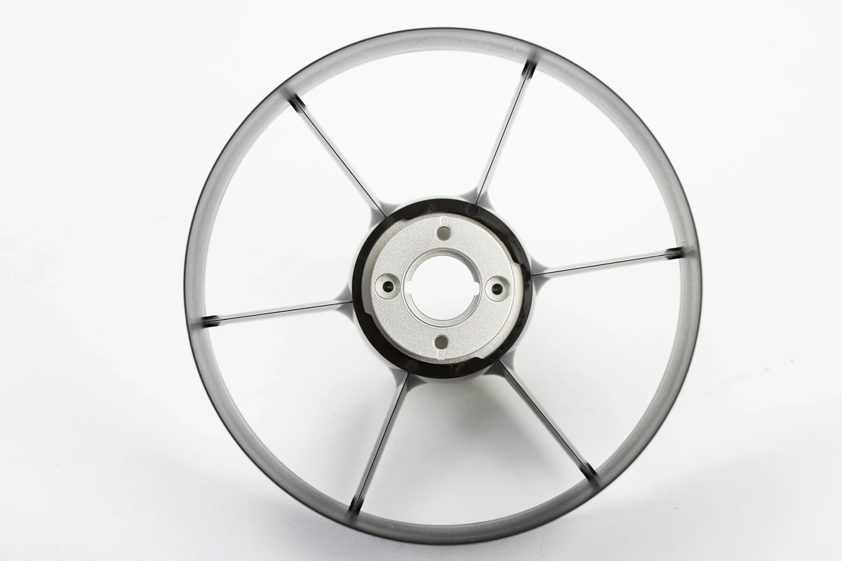 Circular metal assembly with hub and supports