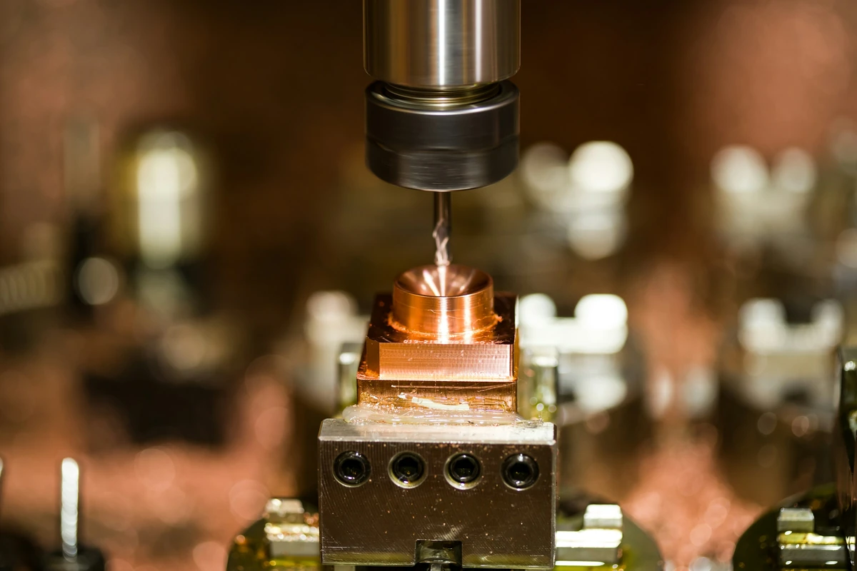 Copper component secured in a machining fixture